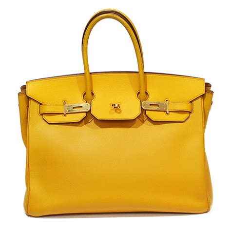 hermes yellow leather bag.